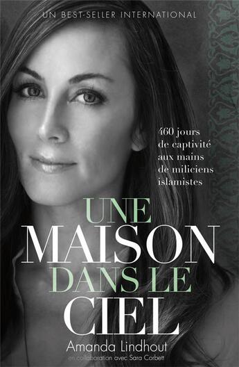 Couverture du livre « Une maison dans le ciel ; 460 jours de captivité aux mains de miliciens islamistes » de Amanda Lindhout aux éditions Seramis