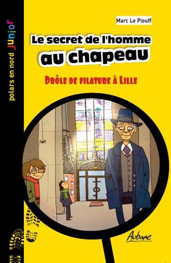 Couverture du livre « Le secret de l'homme au chapeau ; drôle de filature à Lille » de Marc Le Piouff aux éditions Aubane