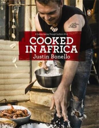 Couverture du livre « Cooked in Africa » de Justin Bonello aux éditions Michael Joseph