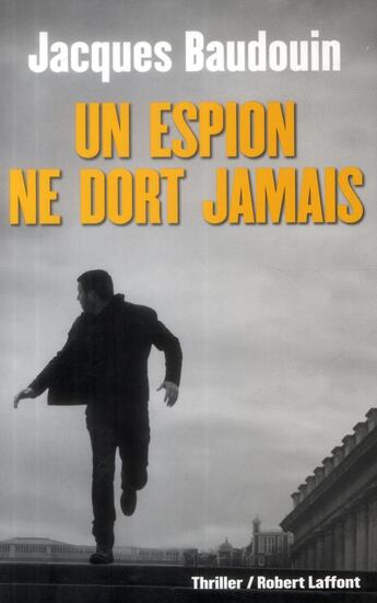 Couverture du livre « Un espion ne dort jamais » de Jacques Baudouin aux éditions Robert Laffont