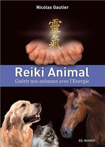 Couverture du livre « Reiki animal ; guérir nos animaux avec l'énergie » de Nicolas Gautier aux éditions Niando