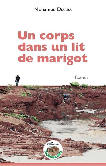 Couverture du livre « Un corps dans un lit de marigot » de Mohamed Diarra aux éditions L'harmattan