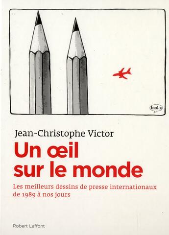 Couverture du livre « Un oeil sur le monde ; l'actualité à travers les dessins de presse internationaux de 1989 à nos jours » de Jean-Christophe Victor aux éditions Robert Laffont