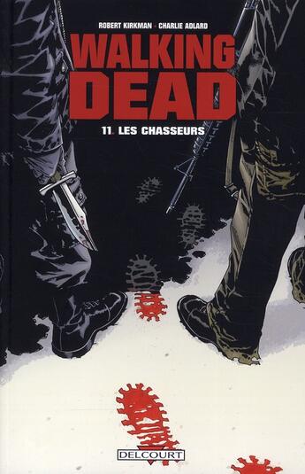 Couverture du livre « Walking Dead Tome 11 : les chasseurs » de Charlie Adlard et Robert Kirkman aux éditions Delcourt