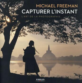 Couverture du livre « Capturer l'instant ; l'art de la photographie » de Michael Freeman aux éditions Eyrolles