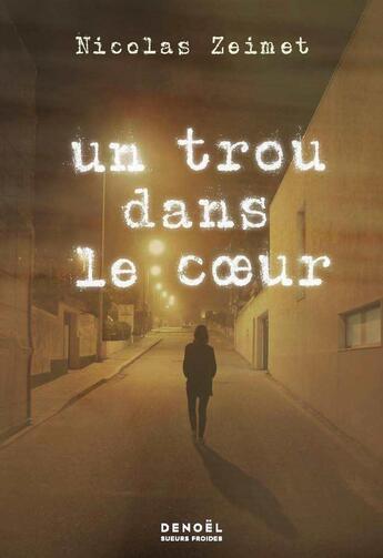 Couverture du livre « Un trou dans le coeur » de Nicolas Zeimet aux éditions Denoel