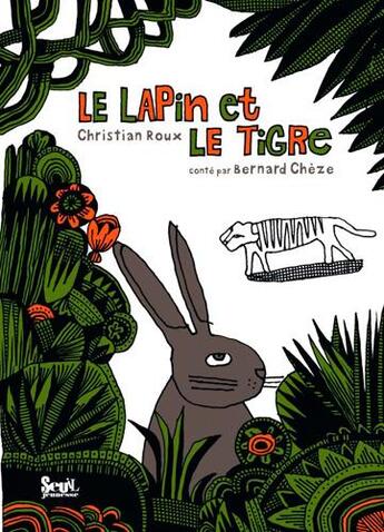 Couverture du livre « Le lapin et le tigre » de Cheze/Roux aux éditions Seuil Jeunesse