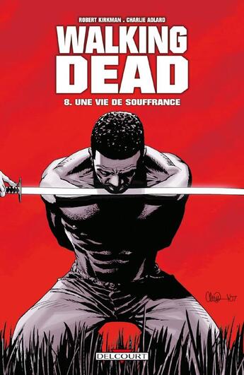 Couverture du livre « Walking Dead Tome 8 : une vie de souffrance » de Charlie Adlard et Robert Kirkman aux éditions Delcourt