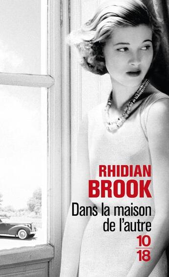 Couverture du livre « Dans la maison de l'autre » de Rhidian Brook aux éditions 10/18