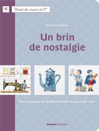 Couverture du livre « Un brin de nostalgie ; des centaines de motifs à broder au point de croix » de Veronique Enginger aux éditions Mango