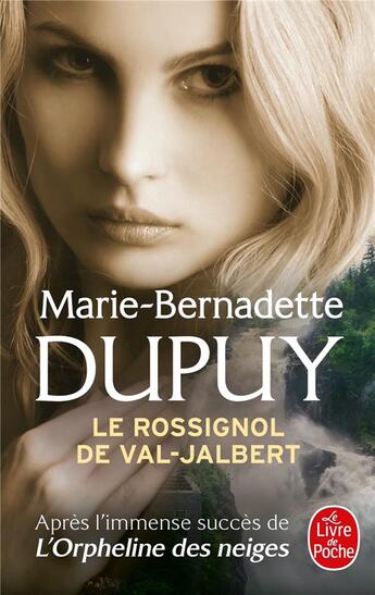 Couverture du livre « L'orpheline des neiges Tome 2 : le rossignol de Val-Jalbert » de Marie-Bernadette Dupuy aux éditions Le Livre De Poche