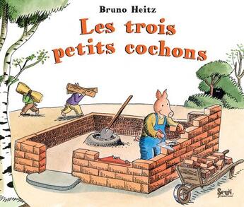 Couverture du livre « Les trois petits cochons » de Bruno Heitz aux éditions Seuil Jeunesse