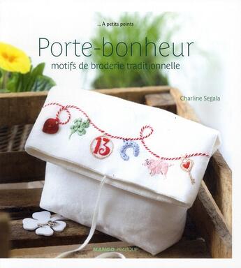 Couverture du livre « Porte bonheur ; motifs de broderie traditionnelle » de Charline Segala aux éditions Mango