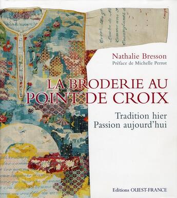 Couverture du livre « La broderie au point de croix ; tradition hier, passion aujourd'hui » de Bresson/Collectif aux éditions Ouest France