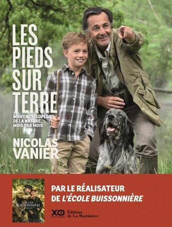 Couverture du livre « Les pieds sur terre ; mon encyclopédie de la nature, mois par mois » de Nicolas Vanier aux éditions La Martiniere