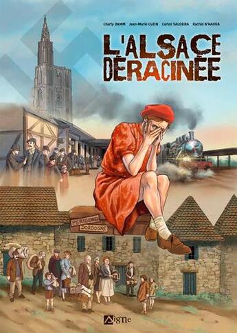 Couverture du livre « L'Alsace déracinée » de Jean-Marie Cuzin et Charly Damn aux éditions Signe