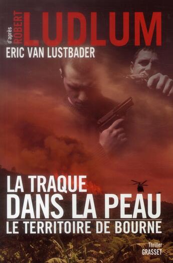 Couverture du livre « La traque dans la peau ; le territoire de Bourne » de Robert Ludlum et Eric Van Lustbader aux éditions Grasset