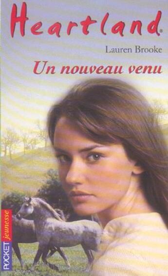 Couverture du livre « Heartland T.23 ; un nouveau venu » de Lauren Brooke aux éditions Pocket Jeunesse