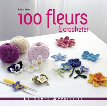 Couverture du livre « 100 fleurs à crocheter » de Caitlin Sainio aux éditions Le Temps Apprivoise