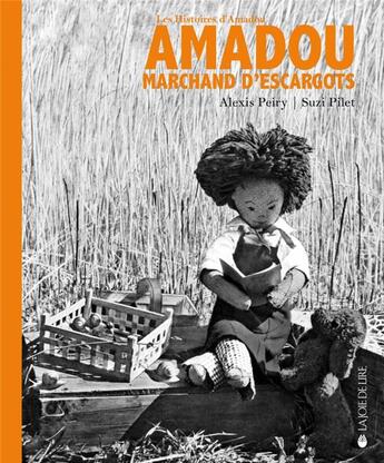 Couverture du livre « Amadou marchand d'escargots » de Alexis Peiry et Suzi Pilet aux éditions La Joie De Lire