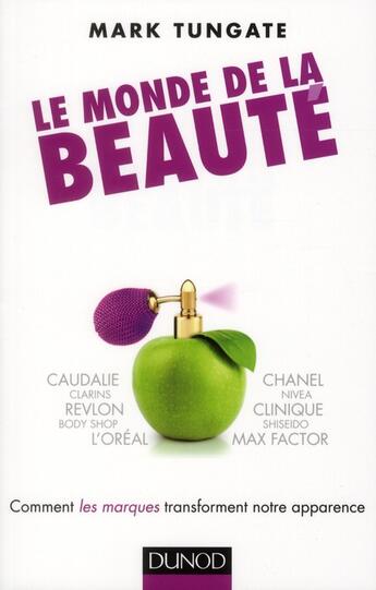 Couverture du livre « Le monde de la beauté ; comment les marques transforment notre apparence » de Mark Tungate aux éditions Dunod