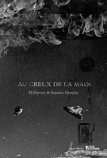 Couverture du livre « Au creux de la main » de Seamus Murphy et Pj Harvey aux éditions L'age D'homme