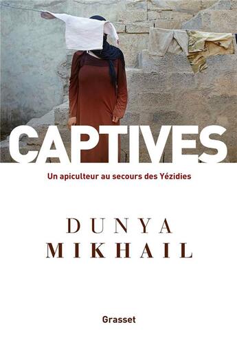 Couverture du livre « Captives : un apiculteur au secours des Yézidis » de Dunya Mikhail aux éditions Grasset