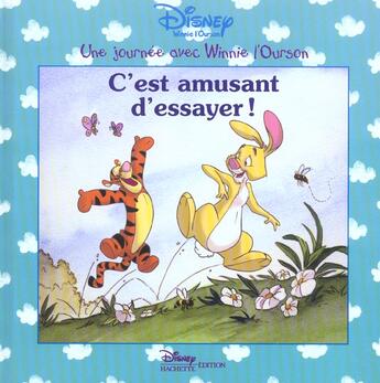 Couverture du livre « Une journée avec Winnie l'Ourson ; c'est amusant d'essayer ! » de Disney aux éditions Disney Hachette