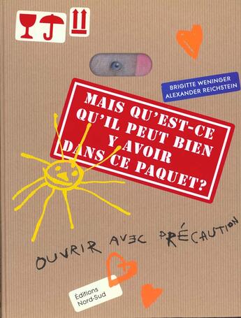 Couverture du livre « Mais Qu'Est-Ce Qu'Il Peut Bien Y Avoir Dans Ce Paquet » de A Reichstein aux éditions Nord-sud