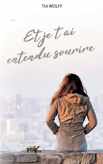 Couverture du livre « Et je t'ai entendu sourire » de Tia Wolff aux éditions Books On Demand