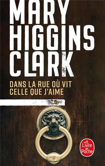 Couverture du livre « Dans la rue ou vit celle que j'aime » de Mary Higgins Clark aux éditions Le Livre De Poche