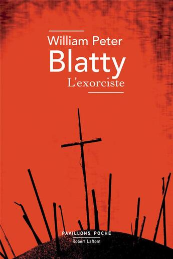 Couverture du livre « L'exorciste » de William Peter Blatty aux éditions Robert Laffont