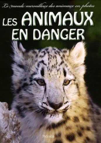 Couverture du livre « Le monde merveilleux des animaux en photos ; les animaux en danger » de  aux éditions Piccolia