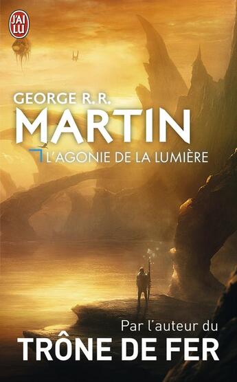 Couverture du livre « L'agonie de la lumière » de George R. R. Martin aux éditions J'ai Lu