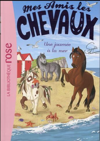 Couverture du livre « Mes amis les chevaux Tome 14 : une journée à la mer » de Sophie Thalmann aux éditions Hachette Jeunesse