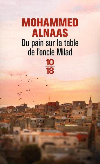 Couverture du livre « Du pain sur la table de l'oncle Milad » de Mohammed Alnaas aux éditions 10/18