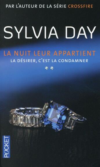 Couverture du livre « La nuit leur appartient Tome 2 ; la désirer, c'est la condamner » de Sylvia Day aux éditions Pocket