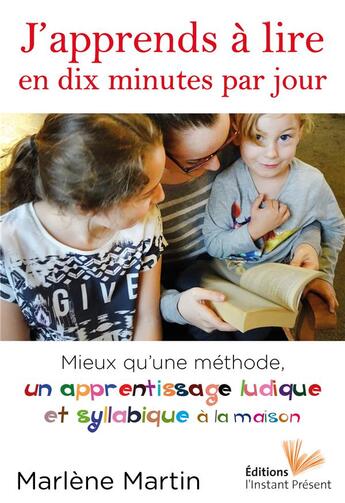 Couverture du livre « J'apprends à lire en dix minutes par jour ; mieux qu'une méthode, un apprentissage ludique et syllabique à la maison » de Marlene Martin aux éditions Instant Present