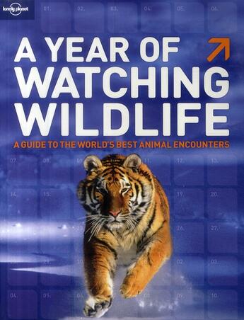 Couverture du livre « A year of watching wildlife ; a guide to the world's best animal encounters » de David Lukas aux éditions Lonely Planet France