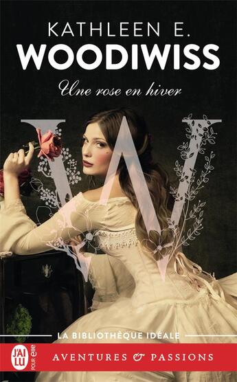 Couverture du livre « Une rose en hiver » de Kathleen E. Woodiwiss aux éditions J'ai Lu