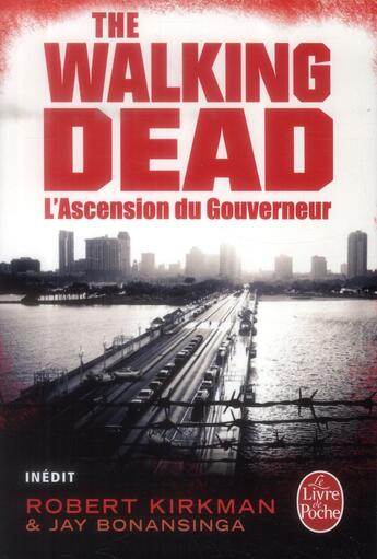 Couverture du livre « The walking dead Tome 1 : l'ascension du gouverneur » de Robert Kirkman et Jay R. Bonansinga aux éditions Le Livre De Poche