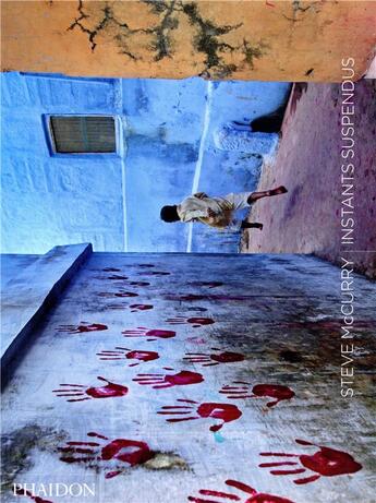 Couverture du livre « Instants suspendus » de Steve Mccurry aux éditions Phaidon