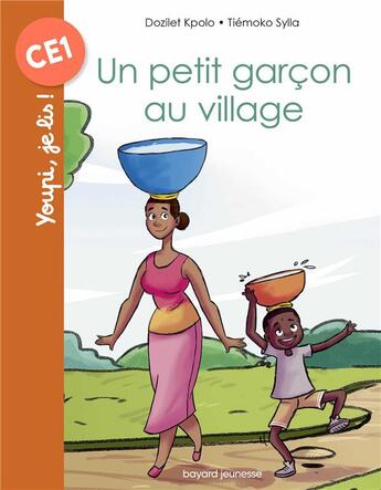 Couverture du livre « Un petit garçon au village » de Dozilet Kpolo et Tiemoko Sylla aux éditions Bayard Jeunesse