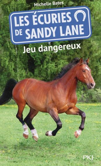 Couverture du livre « Les écuries de Sandy Lane ; jeu dangereux » de Michelle Bates aux éditions Pocket Jeunesse