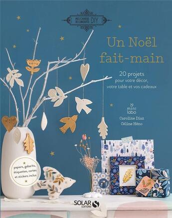 Couverture du livre « Un Noël fait-main : 20 projets pour votre décor, votre table et vos cadeaux » de Mini Labo aux éditions Solar