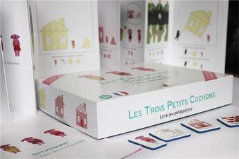 Couverture du livre « Les trois petits cochons ; livre jeu pédagogique » de Florine Caro aux éditions Tom Pousse