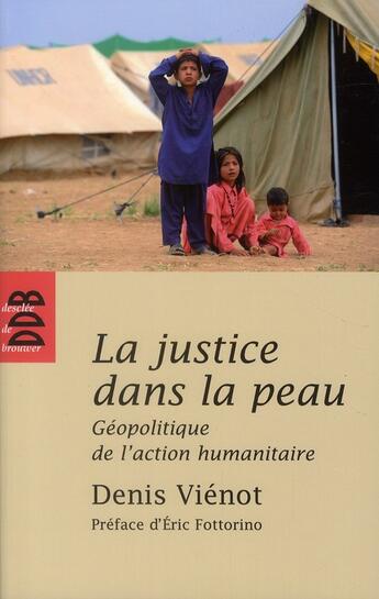 Couverture du livre « La justice dans la peau ; géopolitique de l'action humanitaire » de Denis Vienot aux éditions Desclee De Brouwer