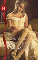 Couverture du livre « Troublée par un débauché » de Carole Mortimer aux éditions Harlequin