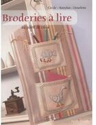 Couverture du livre « Broderies à lire ; au point de croix » de Cecile Dourlens aux éditions Tutti Frutti