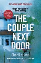 Couverture du livre « THE COUPLE NEXT DOOR » de Shari Lapena aux éditions Random House Uk